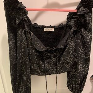 Black off the shoulder ruffled black top!